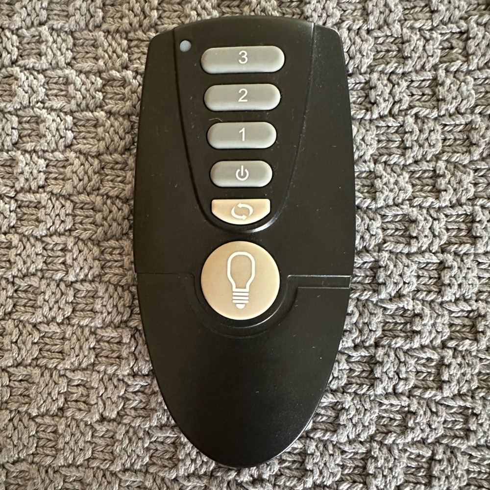 Hampton Bay Altura Ceiling fan remote.